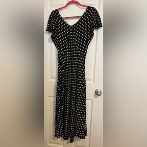 Elegant, sophisticated simple flowy and flattering black polka dot dress
